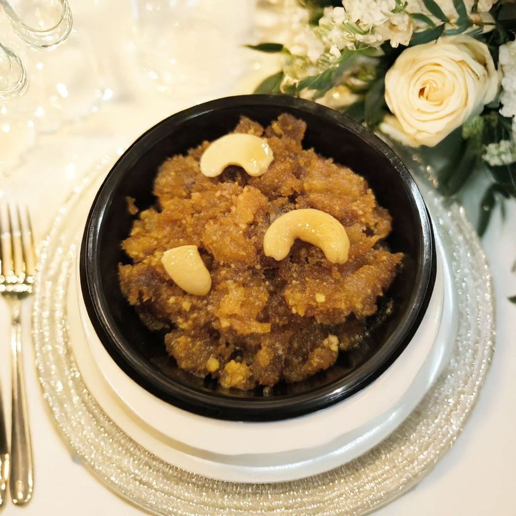Close-up of Double Ka Meetha garnished with almonds and pistachios.