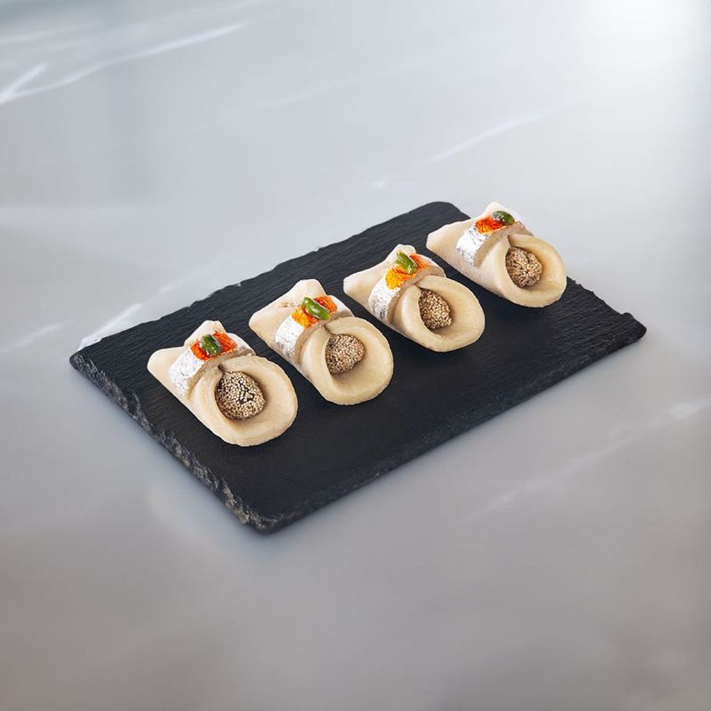 Kaju Daffodil – Traditional North Indian cashew sweet in daffodil shape with a creamy, nutty finish.