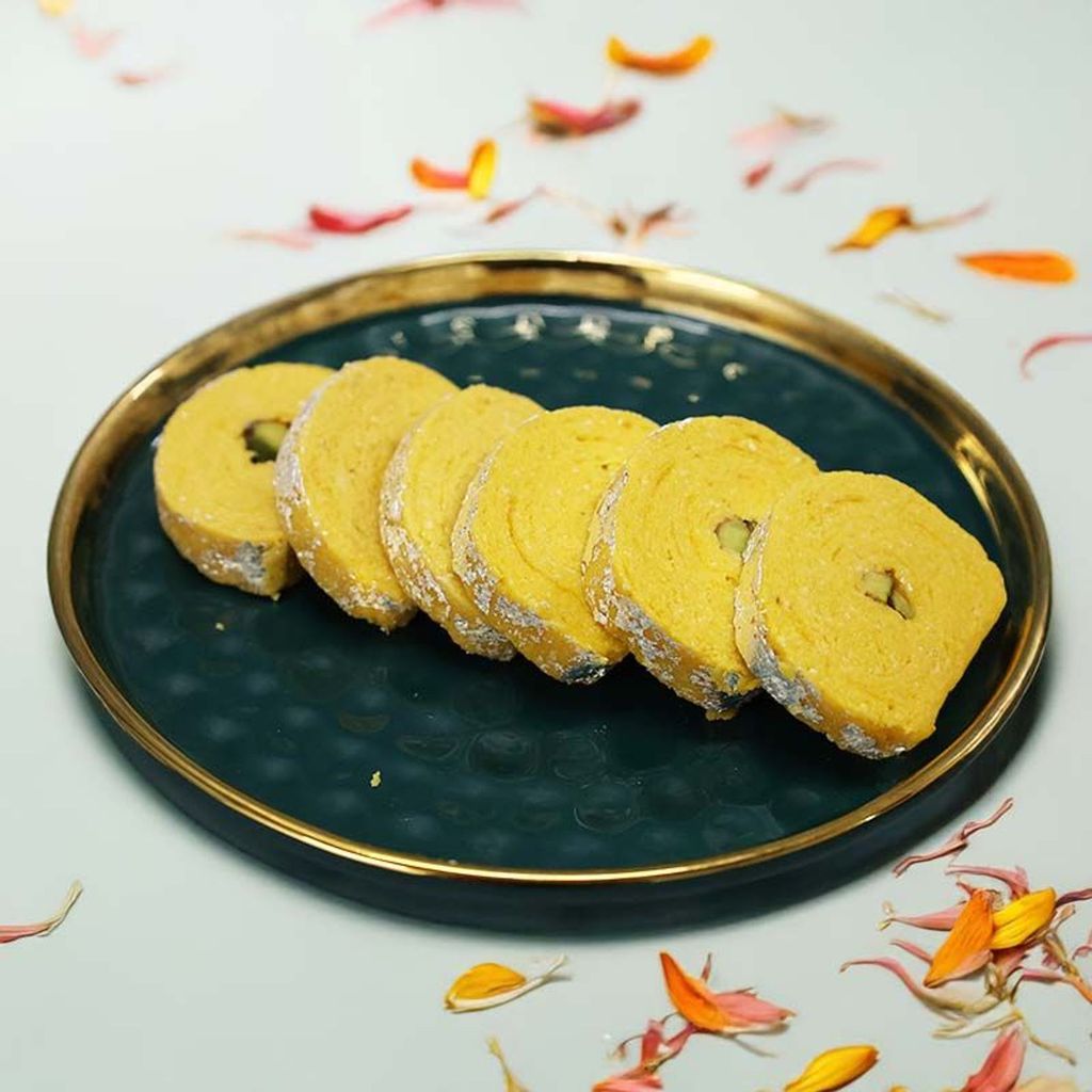 Kesar Roll – Traditional North Indian Saffron Sweet crafted with rich khoya and premium nuts.