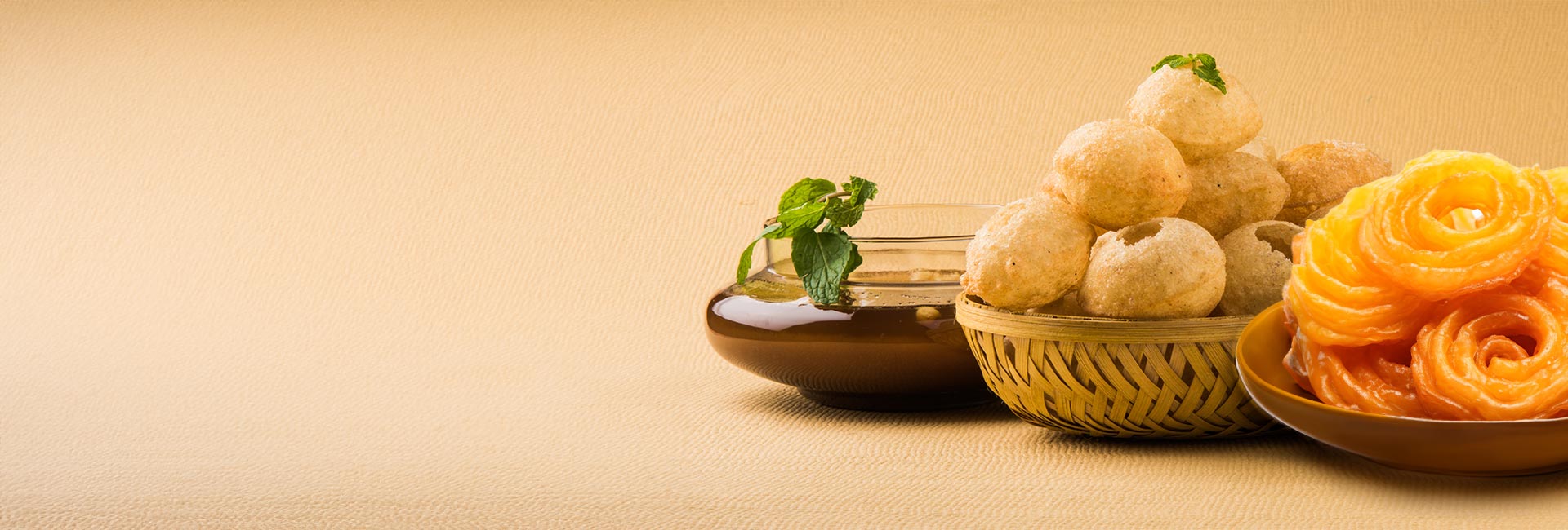 bowl-of-indian-sweets-and-savories-including-jalebi-and-chaat.