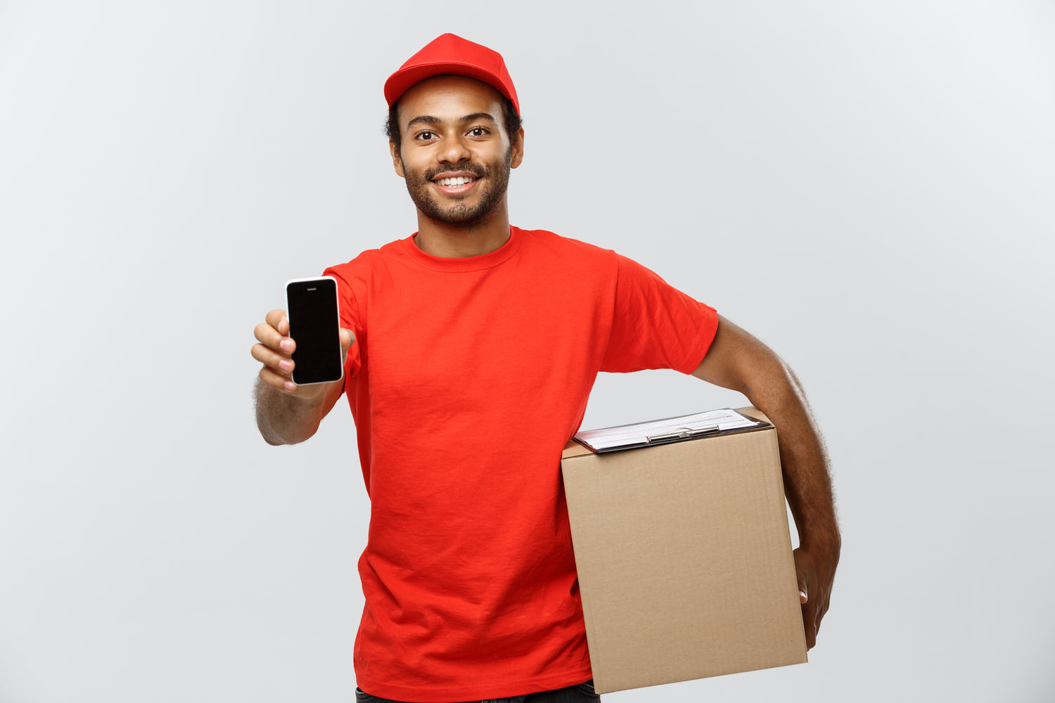 delivery man with a phone and package