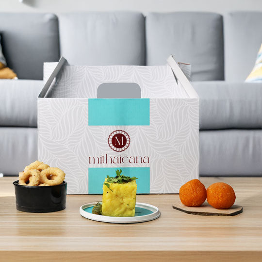 mithaicana snack gift box with Dhoklas, murukkus, and laddoos