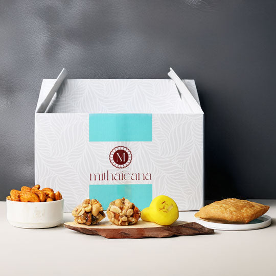 mithaicana snack box with delicious indian sweets and snacks assortment