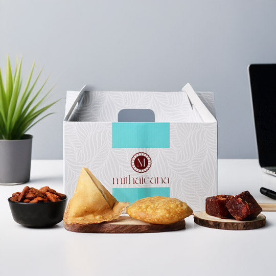 mithaicana snack gift box with samosas, pakoras, almonds and halwas